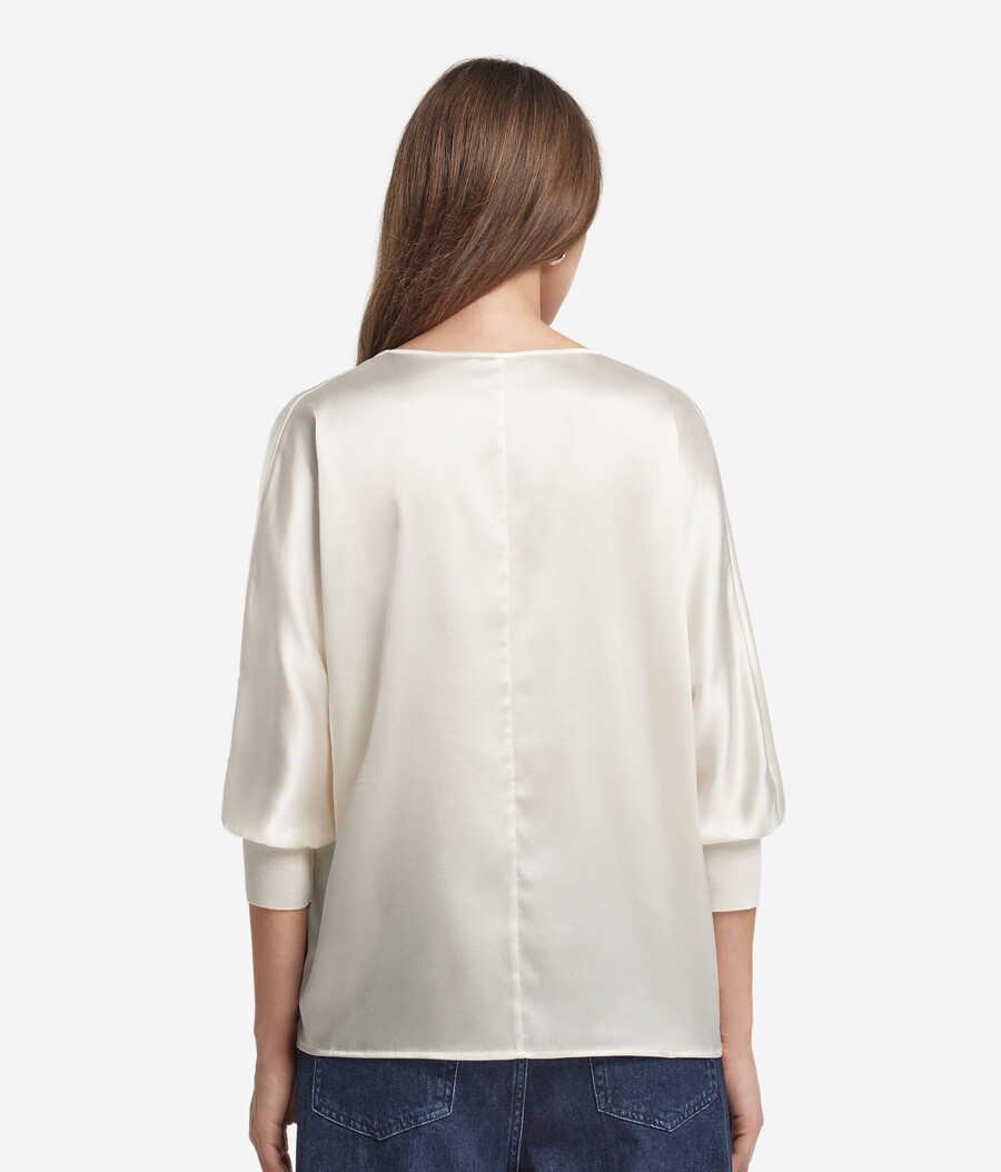 blusa de seda con cuello en v