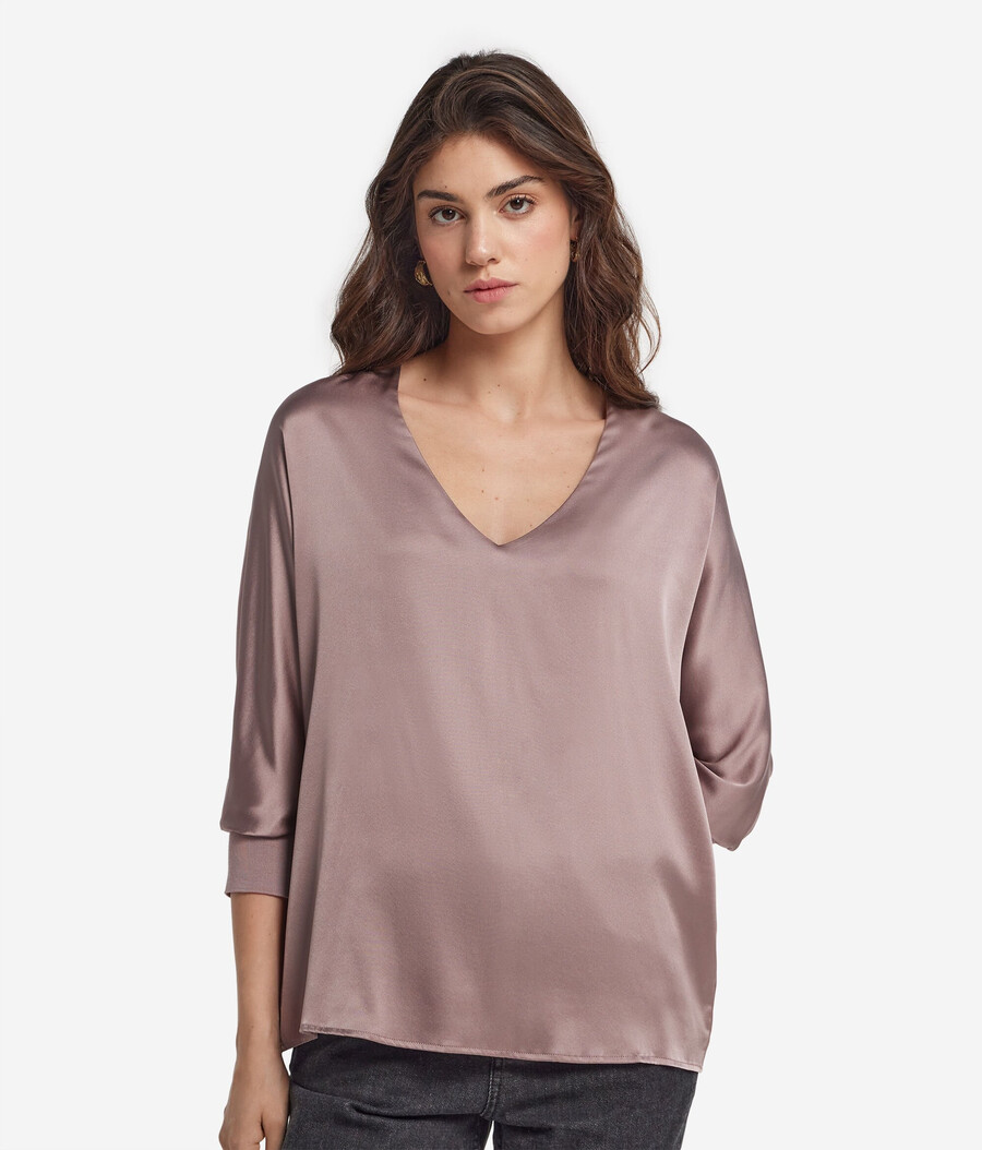 blusa de seda con cuello en v