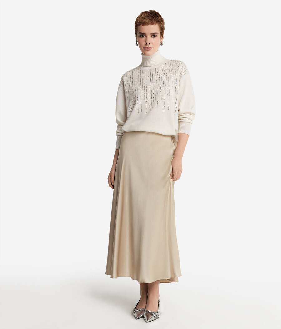 jersey de cuello alto de cachemira con pedrería
