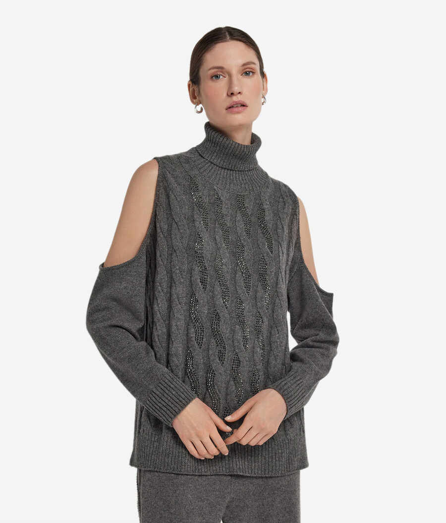 top de cachemira ultrasuave con aberturas punto trenzado y pedrería