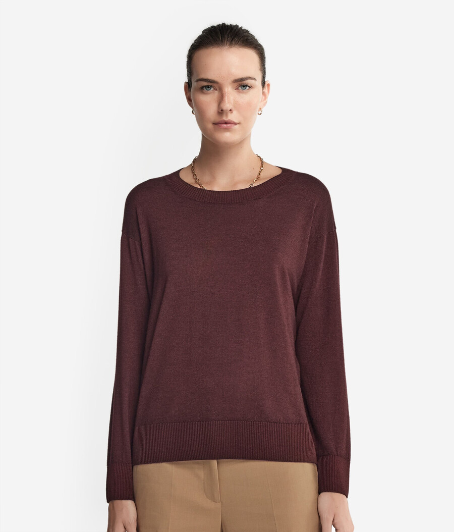 jersey de cachemira con cuello redondo y aberturas