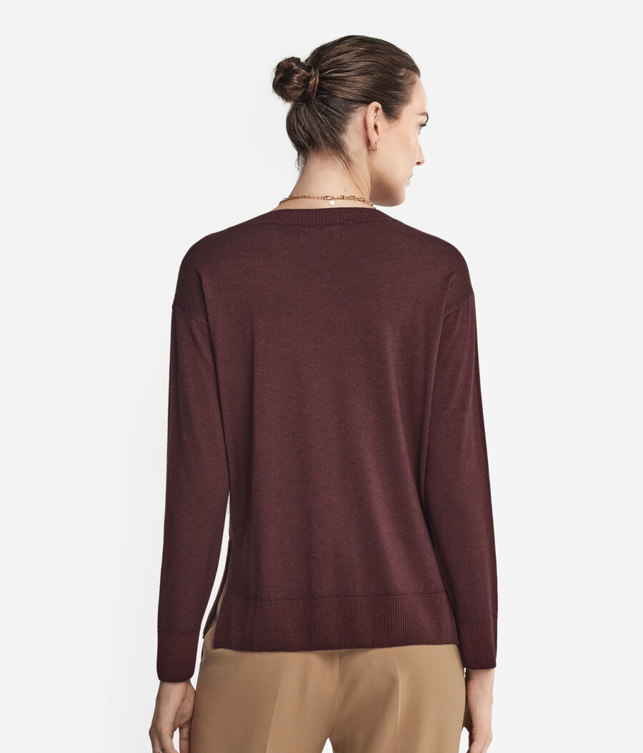 jersey de cachemira con cuello redondo y aberturas