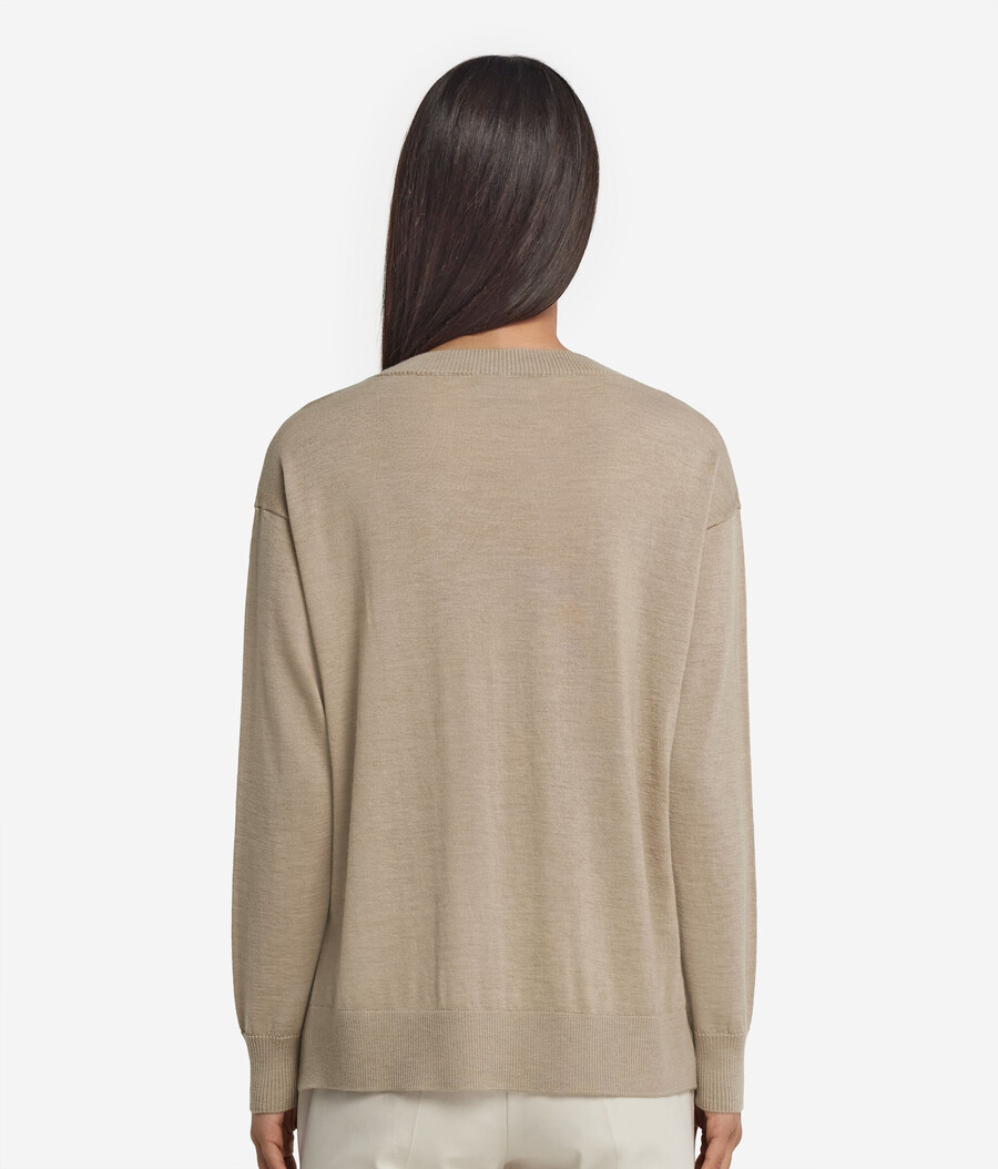 jersey de cachemira con cuello redondo y aberturas
