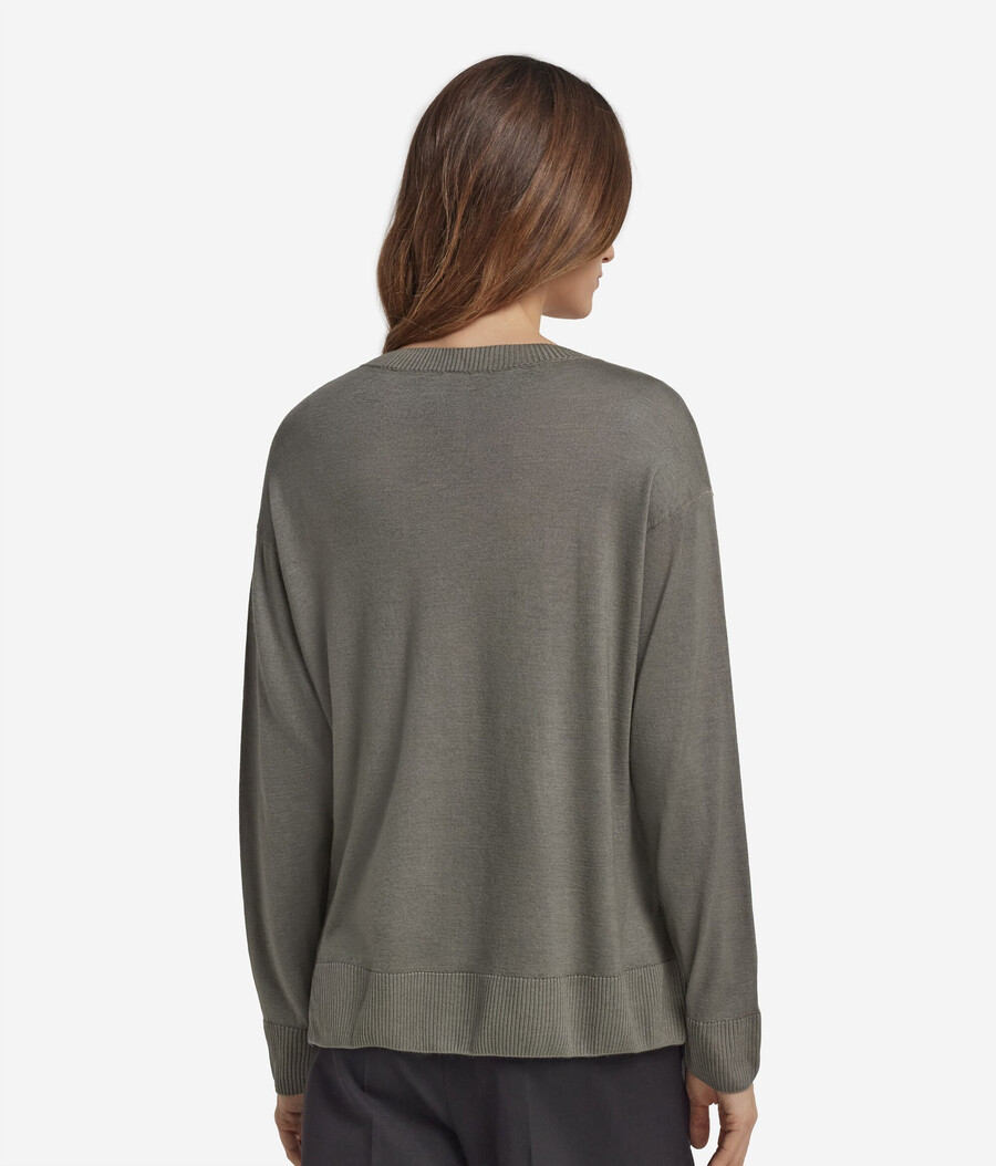jersey de cachemira con cuello redondo y aberturas
