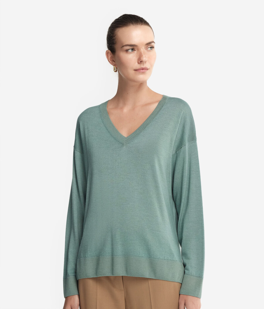 jersey de cachemira con cuello en v y aberturas