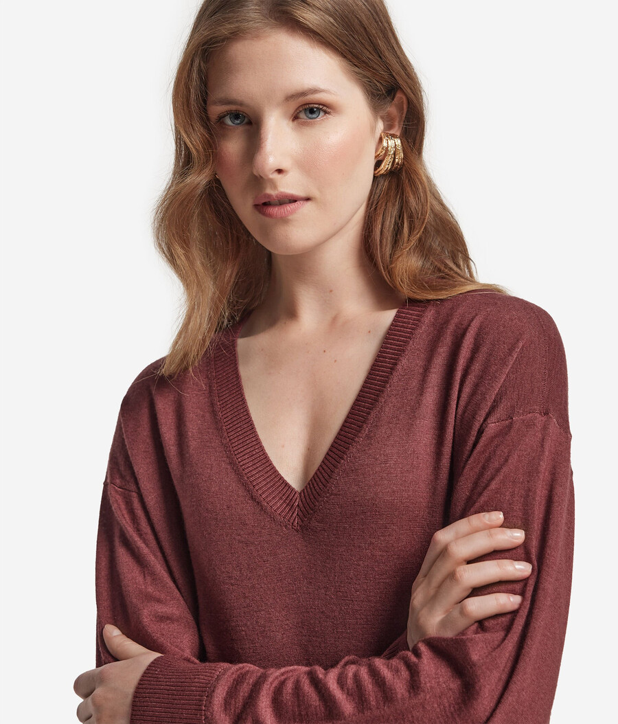 jersey de cachemira con cuello en v y aberturas
